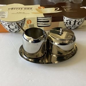Brand new 4 cappuccino cups with little plates included, black and white modern.